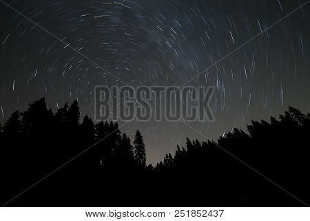 A View Of The Stars Of The Milky Way With A Mountain Top In The Foreground. Night Sky Nature Summer 