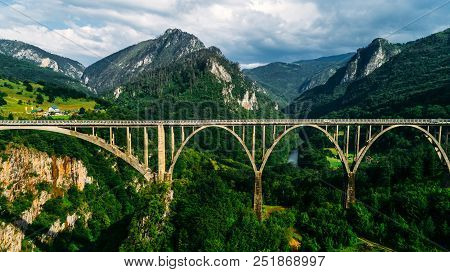 Aerial View Of Durdevica Tara Arc Bridge In The Mountains, One Of The Highest Automobile Bridges In 