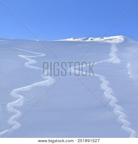 Two Traces From Skis On Snowy Off-piste Slope In Sun Early Morning. Caucasus Mountains In Winter, Sh