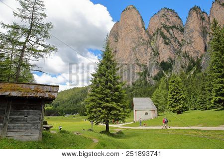 Val Gardena, Italy - June 25, 2018: S. Silvestro Chapel Along Vallunga Valley Above Selva With Mount