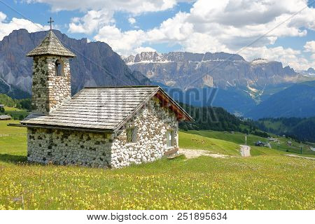 The Chapel Of Mastle Located Near Raiser Pass, With Puez Odle Mountain Range (on The Left) And Sella