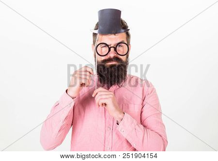 Man Bearded Hipster Hold Cardboard Top Hat And Eyeglasses To Look Smarter White Background. Tricks T