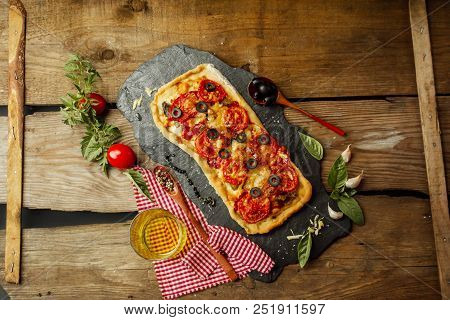 Mixed Pizza With Chicken, Pepper, Olives, Onion, Basil On Pizza Board