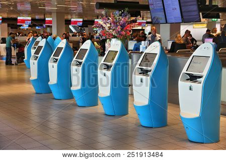 Amsterdam, Netherlands - July 11, 2017: Self Check-in Machines Schiphol Airport In Amsterdam. Schiph
