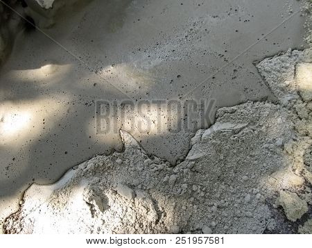 Gray Simple Building Background - Sand-cement Mortar. Cement Texture, Half Photo -  Liquid Mud, Half
