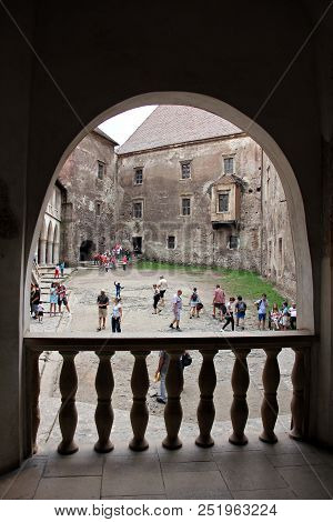 Hunedoara, Romania - June 18: Tourists Visiting The Amazing Corvin Castle In Hunedoara, Romania.