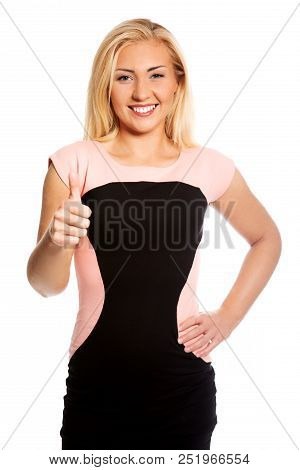 Young Smiling Woman With Tumbs Up Showing Ok On White Background.