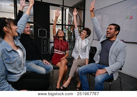 Business Concept. Businessmen Are Shouting With Joy. Business People Are Raising Their Hands For Bus