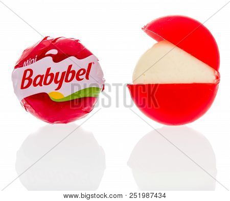 Winneconne, Wi - 30 July 2018: A Single Babybel Semisoft Cheese In Original Flavor On An Isolated Ba