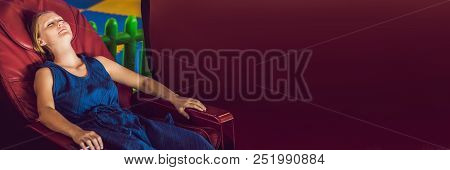Beautiful Young Lady Relaxing In The Massage Chair Banner, Long Format