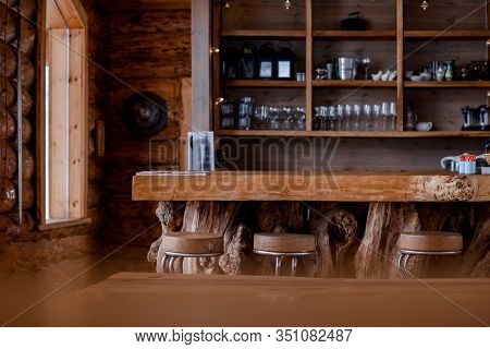 Interior Of A Wooden Hunting Lodge In The Mountains