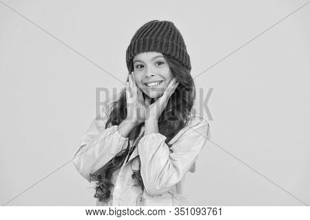 Choose Between Cutest And Trendiest. Kid Girl Wear Knitted Hat. Winter Hat Accessory. Girl Long Hair