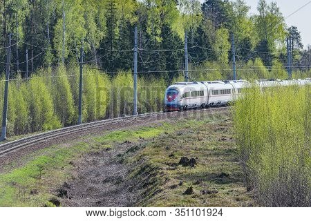 Highspeed Train Approaches To The Station At Spring Day Time. Moscow. Rusia.