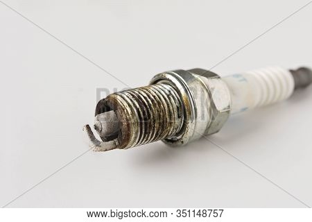 Used Spark Plug. Spark Plug Of The Car After 100000 Km Of Run. Close Up
