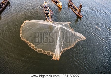 Mandalay, Myanmar - Nov 12, 2019: Fishermen Near U Bein Bridge In Amarapura,mandalay Myanmar