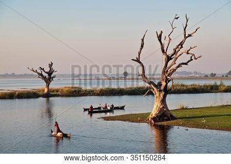 Mandalay, Myanmar - Nov 12, 2019: Fishermen Near U Bein Bridge In Amarapura,mandalay Myanmar