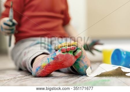 Adorable Cute Caucasian Little Blond Siblings Children Enjoy Having Fun Painting With Brush And Palm