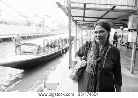 Portrait Of Mature Beautiful Indian Woman Exploring The City