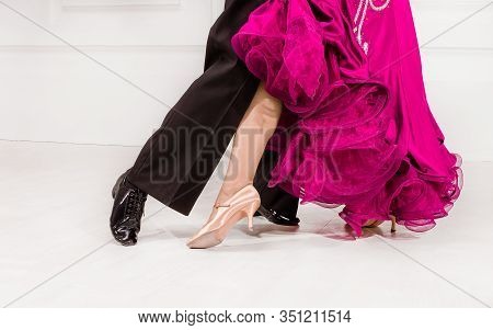 Partner Dance. Close Up Of Dancers Feet. Ballroom Dancers On The Dance Floor.