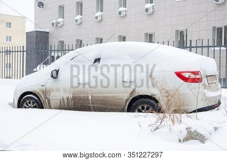 Car Covered With Fresh White Snow, Car After A Heavy Snowfall, A Lot Of Snow On The Car, Car In The 