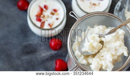 Kefir Grains And Fermented Drink Kefir With Cherries And Walnuts Close Up