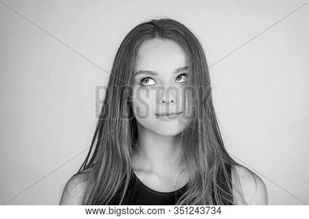 Close Up Portrait Of A Beautiful Young Woman With Blonde Hair. Caucasian Woman Model Posing Indoors