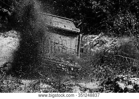 Off Road Sport Truck Between Mountains Landscape. Drag Racing Car Burns Rubber. Extreme. Off-road Ca