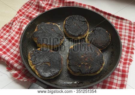 Burnt Pancakes, Cheesecakes, Food In A Pan. Fried Foods Are Unhealthy.