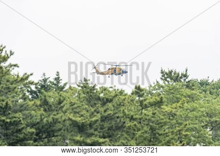Fairhaven, Massachusetts, Usa - July 17, 2019: U.s. Coast Guard Mh-60 Jayhawk Helicopter Flying Low 