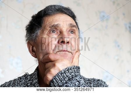 Elderly Man Thinking About Something. Concept Of Brain Activity In Old Age, Memories Of The Past, Sa