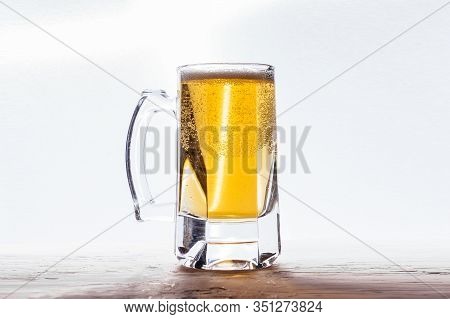 Beer In A Mug On A White Background.