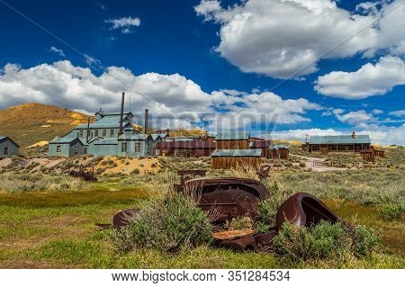 View Of The Bodie, Ghost Town. Bodie State Historic Park. Abandoned Wooden Houses And Standard Conso