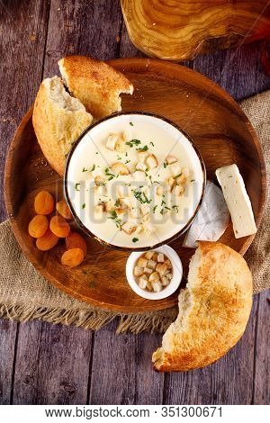 Mushroom Soup With Parsley And Mushrooms In A Plate On The Table