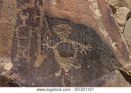 Strange Shapes And Figures That Have Been Carved Into The Ancient Sandstone Rocks At Legend Rock Sta