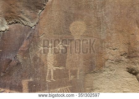 Strange Shapes And Figures That Have Been Carved Into The Ancient Sandstone Rocks At Legend Rock Sta