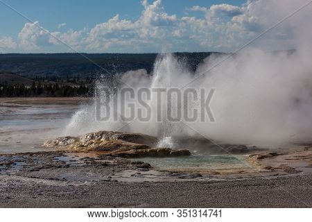 The Formation Of Clepsydra Geyser As Its Shoots Hot Water And Steam Into The Air At Yellowstone Nati