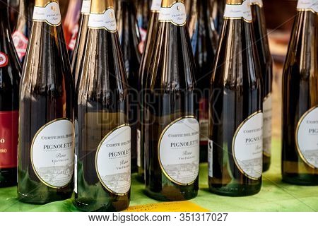 Treviso, Italy - November 8, 2019: Bottles Of Pignoletto Sparkling Wine From Corte Del Borgo For Sal