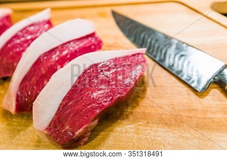 Beautiful Photo Of Picanha (top Sirloin Cap) Cuts On A Wooden Cu