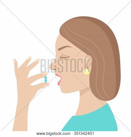 A Young Woman Takes A Pill.medicine, Vitamins, Supplements.antiviral Agent, Coronavirus, Treatment O