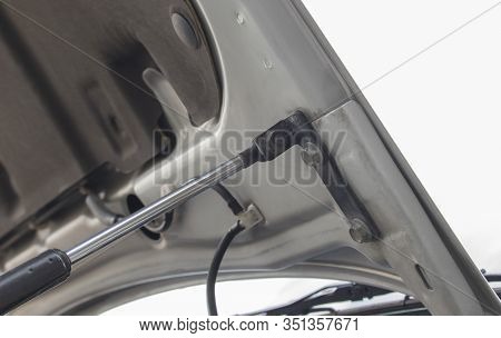 Bolt And Hydraulic Mounting Bracket For Opening The Car Bonnet Inside The Engine Room, The Support I