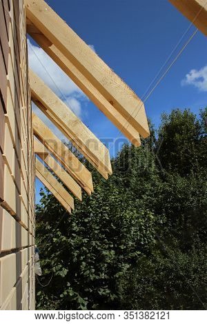 Roof Trusses Not Covered With Ceramic Tile On A Detached House Construction, Visible Roof Elements,