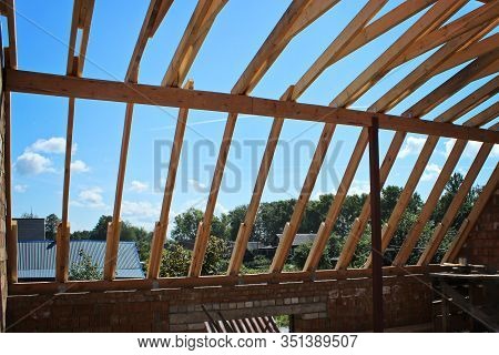 Roof Trusses Not Covered With Ceramic Tile On Detached House Under Construction,visible Roof Element