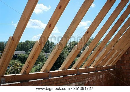 Roof Trusses Not Covered With Ceramic Tile On Detached House Under Construction, Visible Roof Elemen
