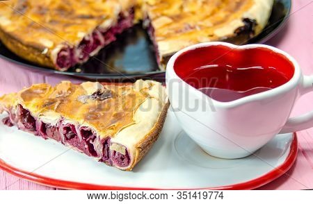 Fresh Slice Of Cherry Pie With Heart Shaped Cup.traditional Bulgarian Pie Banitsa Made From Filo Pas