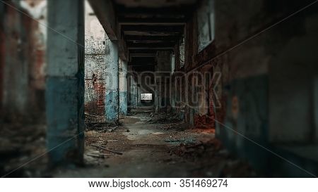 Long Corridor Of Ruined Abandoned Eerie Pillar Industrial Building With Blurred Vignette, Vintage To