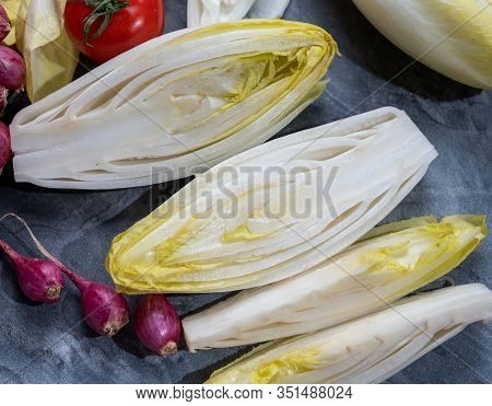Fresh Belgian Endive Or Chicory Bitter Salad Ready To Cook Or Eat