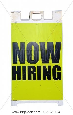NOW HIRING. A Now Hiring A Frame Sign. Help Wanted. Now Hiring signboard. Looking for work. Looking for employees. Looking to hire. Job Offer. Yellow Sign. Isolated on white.