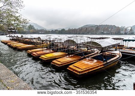 In Winter, Boat Docked Near Leifeng Pagoda At Xihu West Lake In Hangzhou, China