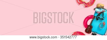 Travel Bag With All The Traveller Equipment, Swimrings, Modern Design Of Flyers. Coral Background Wi