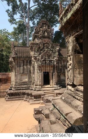 Beautiful, Detailed Murals On Ancient Temple Ruins, Religon Symbols In Angkor Wat On Red Brown Sand,